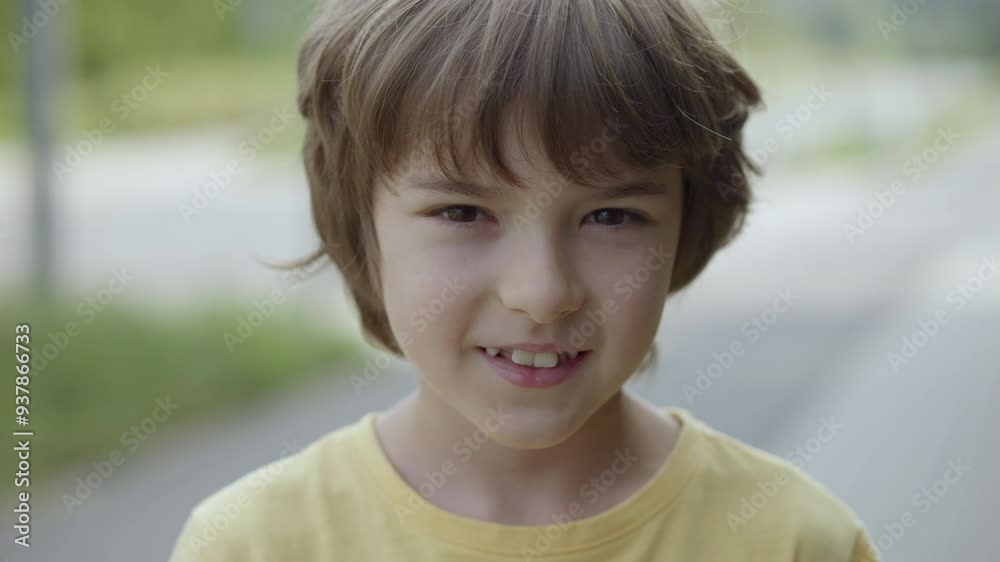 Portrait Smiling Teenage Boy Looking at Camera in Summer Sun Day. Laughs Happily Child at Outdoors. Inquisitive Little Boy Portrait. Happy Face Funny Contemplative Child Smile Freedom and Wellness. Portrait Smiling Teenage Boy Looking at Camera in Summer Sun Day. Laughs Happily Child at Outdoors. Inquisitive Little Boy Portrait. Happy Face Funny Contemplative Child Smile Freedom and Wellness.