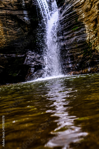 water flowing over rocks photo