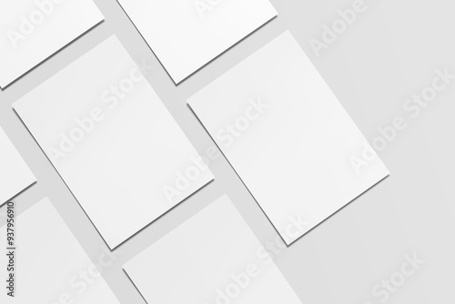 White blank sheets of a4 paper size or documents mockup on a gray background. Template for design.