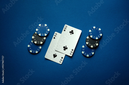 One pair of playing cards in poker gives a small win of chips. The concept of winning in a card game. A lucky win photo