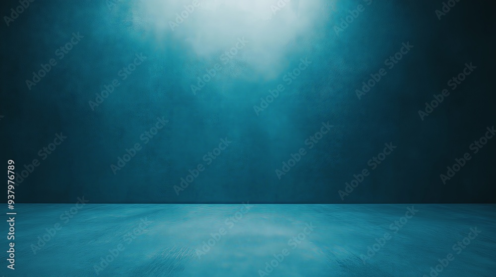 Empty room with a teal textured wall and a spotlight creating a moody atmosphere
Empty room with a teal textured wall and a spotlight creating a moody atmosphere