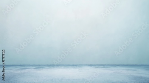 Minimalistic empty room with soft blue lighting and a smooth floor surface

