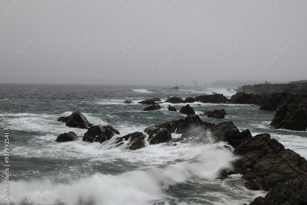 A rocky shoreline on the Atlantic Ocean in The Dungeon Provincial Park, Bonavista Peninsula Newfoundland and Labrador, Canada. A rocky shoreline on the Atlantic Ocean in The Dungeon Provincial Park, Bonavista Peninsula Newfoundland and Labrador, Canada.