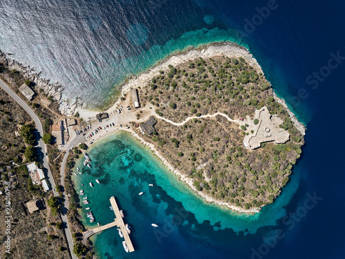 Aerial drone panorama landscape of Porto Palermo Castle (Albanian: Kalaja e Porto Palermos), beach and pier for yachts and boats, near Himare in southern Albania photo