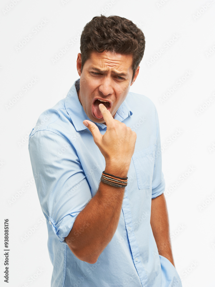 Man, finger and disgust expression in studio for negative, omg and wtf shock reaction. Model, review and face for bad news, gossip or mocking drama with rejection emoji isolated on white background Man, finger and disgust expression in studio for negative, omg and wtf shock reaction. Model, review and face for bad news, gossip or mocking drama with rejection emoji isolated on white background