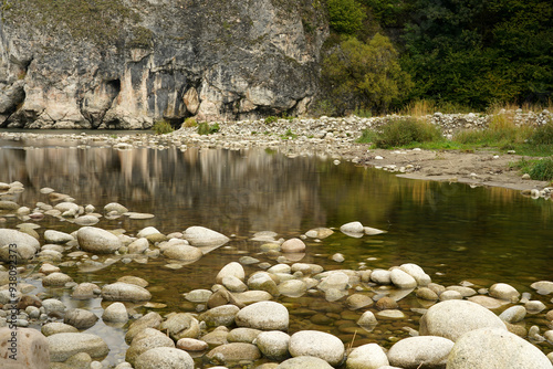 Autumn in the mountains, stones in the current of Bialka river photo