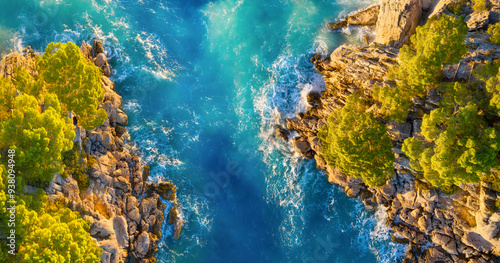 Drone view of the sea coast. Rocky shore and sea water. Vacation and travel. Summer seascape. aerial view. Image for cards, background, wallpaper or design.