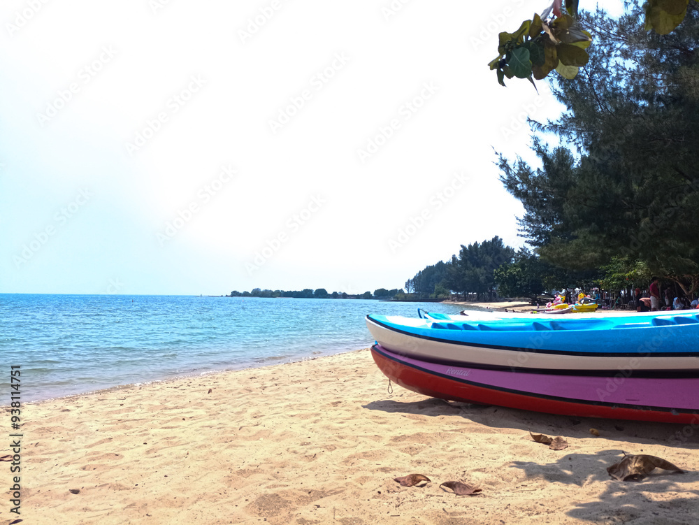 Fototapeta premium Canoes are displayed on Blebak Beach, Jepara