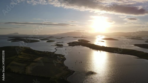 A drone pan showing a stunning sunset among the islands. Clew Bay, Westport, Mayo, Ireland