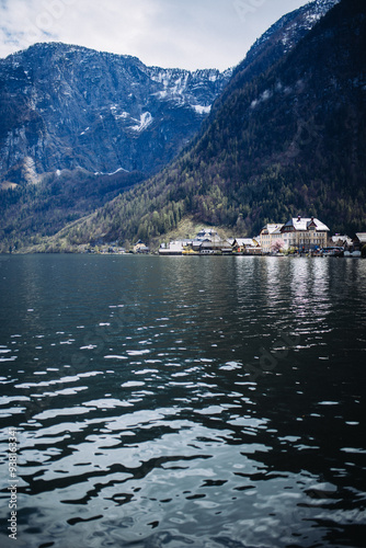 Fotografie Scenic lake view with mountains and quaint  village