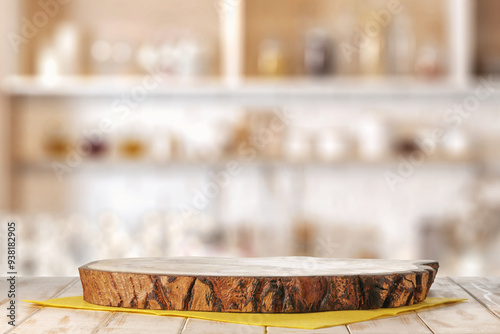 Wooden kitchen cutting board on yellow napkin