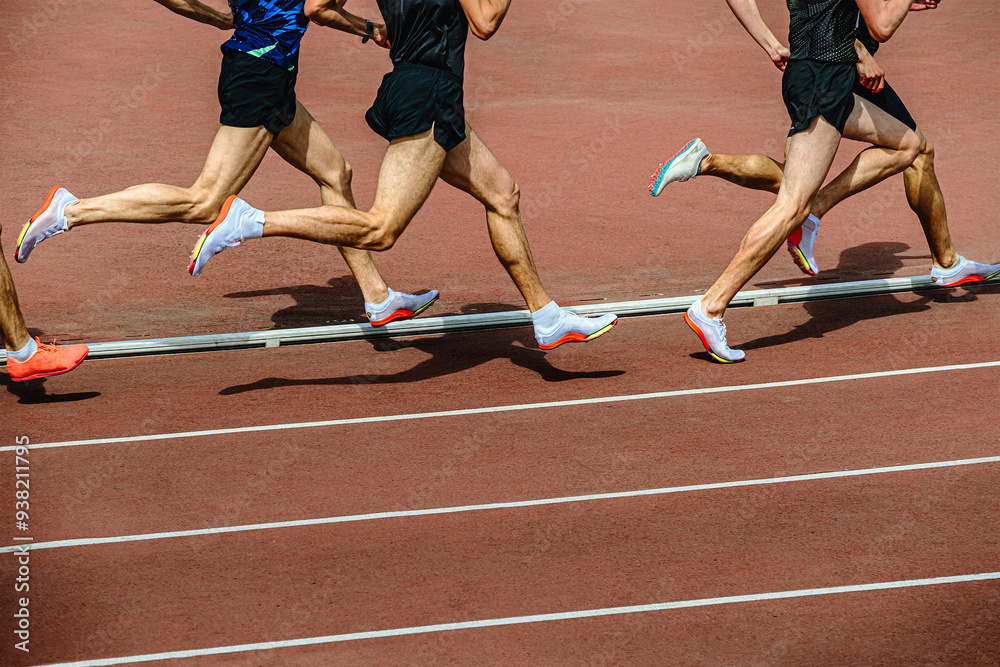 Fototapeta premium group athletes running 800 meters at stadium