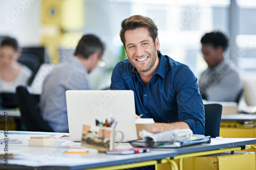 Portrait, businessman and laptop in office for research, online inspiration and ideas for website creation. Career, male person or graphic designer with computer for solution, smile and coworking