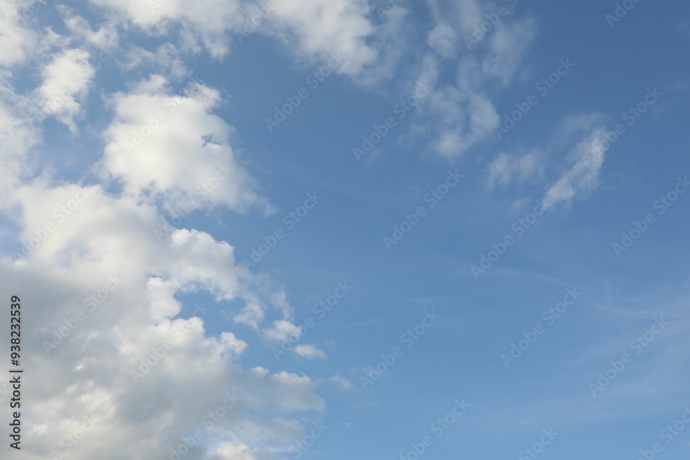 Beautiful view of blue sky with fluffy clouds Beautiful view of blue sky with fluffy clouds