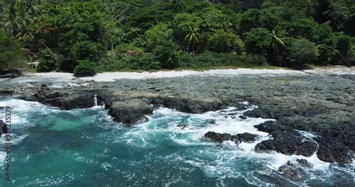 Areal drone view of Montezuma tropical beach in Nicoya Peninsula, in Costa Rica, central America