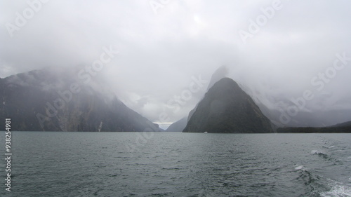 fog over the mountains in a cloudy day at the sea