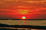 Red sunset on the water