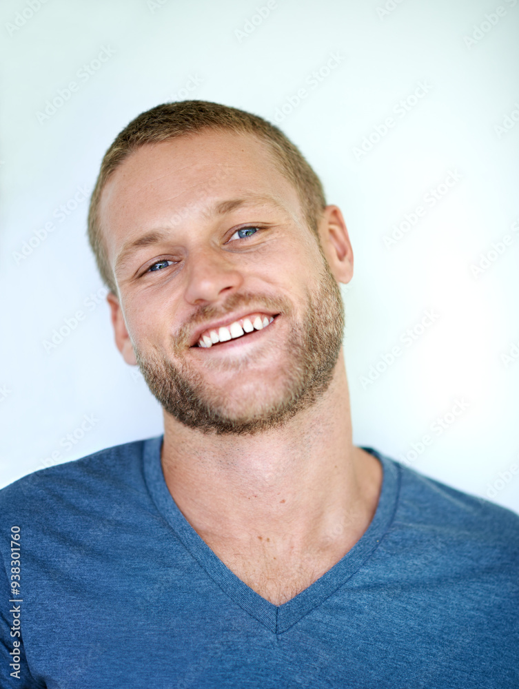 Obraz premium Laughing, portrait and man in studio with casual fashion, confidence and creative career in design. Smile, face and young professional with cool pride, gen z style and happy fun on white background