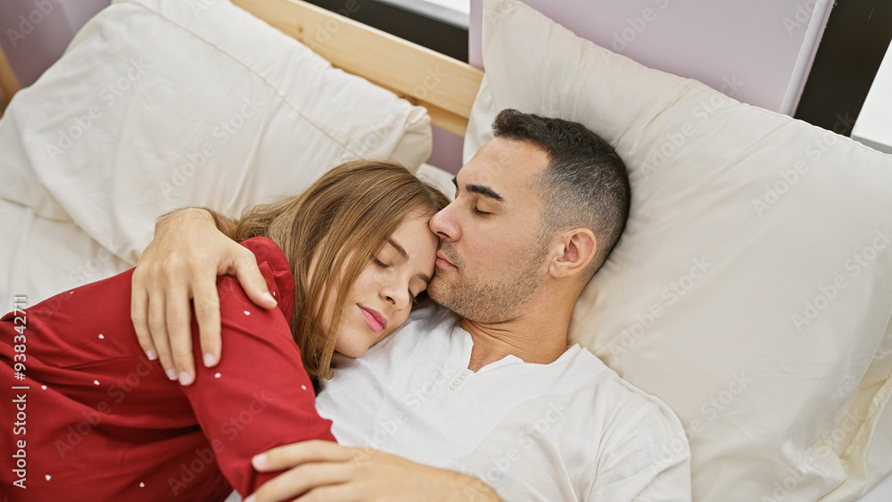 A loving couple enjoys an intimate moment together in a cozy bedroom setting, highlighting affection and comfort. A loving couple enjoys an intimate moment together in a cozy bedroom setting, highlighting affection and comfort.