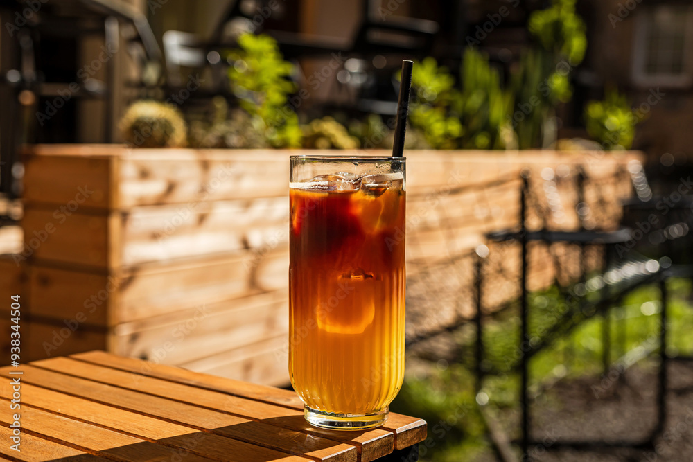 Bumble cold coffee drink, espresso and orange juice, on the terrace of a cafe Bumble cold coffee drink, espresso and orange juice, on the terrace of a cafe