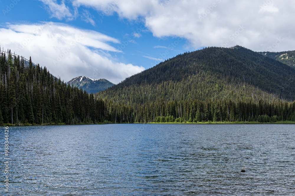 Beautiful waters of the Lightning Lake at Manning Park British Columbia Canada with clouds over the mountains Beautiful waters of the Lightning Lake at Manning Park British Columbia Canada with clouds over the mountains