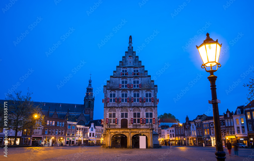Obraz premium A scenic view of Stadhuis van Gouda, is old City Hall of Gouda in the Netherlands.
