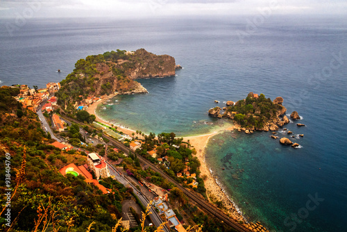 Beautiful landscape of Taormina, Italy. Sicilian seascape with beach and island Isola Bella. Travel photography.