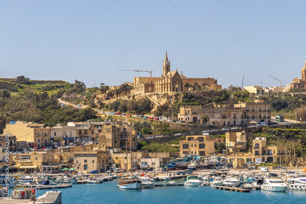 Naklejka premium Malta, Gozo Island, town of Mgarr from the harbor.