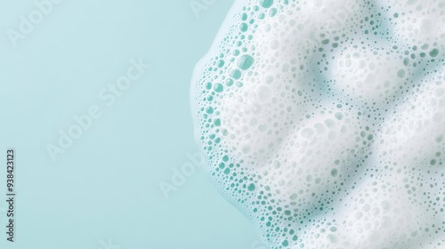 Bubbly facial foam on a smooth surface, skincare texture, luxurious lather