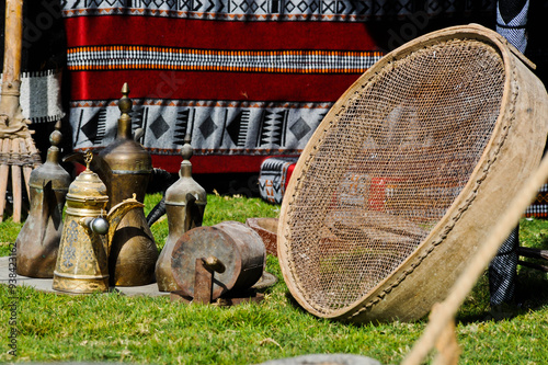 Iconic Abrian fabric is graced with sybbols of Arabia, in particular Arabic tea and coffee, they symbolize Arabian hospitality. photo