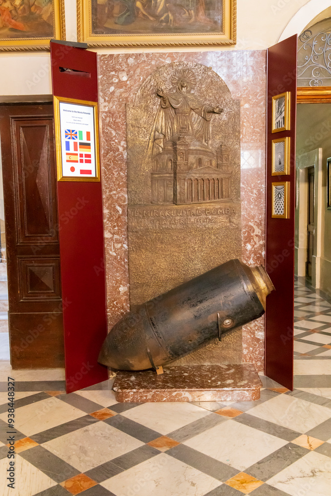 23 Mar 2023. Malta, Mosta. Sanctuary Basilica of the Assumption of Our Lady, commonly known as the Rotunda of Mosta or the Mosta Dome. Replica of the bomb which pierced the dome on 9 April 1942.