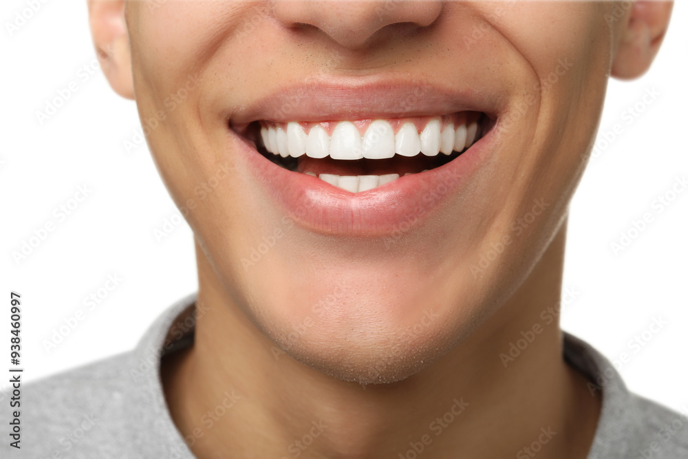 Happy young man on white background, closeup. Dental veneers Happy young man on white background, closeup. Dental veneers