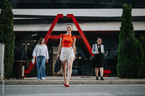 Confident businesswomen walking outdoors to work, exemplifying leadership, empowerment, and professionalism in a modern business environment.