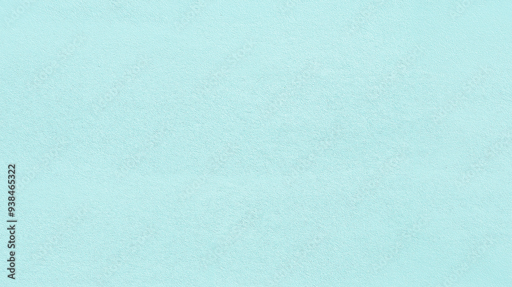 a seamless texture of slightly textured colored paper in pastel aqua marine color