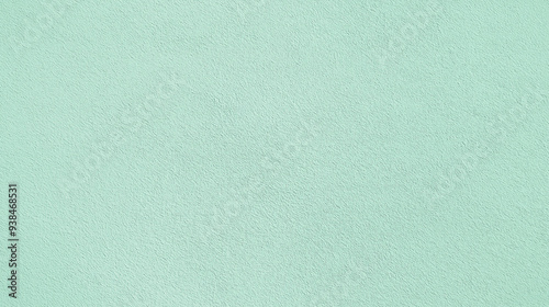 a seamless texture of slightly textured colored paper in powder mint green color
