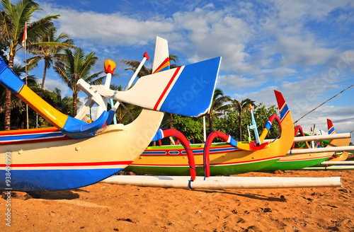 Closeup of colorful Bali Fishing Boats on the Beach at Sanur, Indonesia. photo