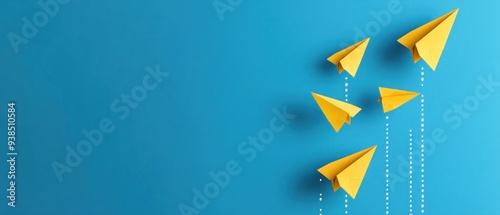 Yellow paper plane on blue background, Success in business growth concept. copy space photo