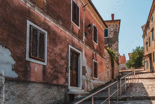 Fototapeta Naklejka Na Ścianę i Meble -  A small street on the Adriatic coast in the old town of Vrsar Croatia 08.07.24