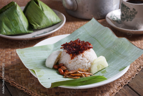 Coconut Rice with Banana Leaf or malay called Nasi Lemak Daun Pisang photo