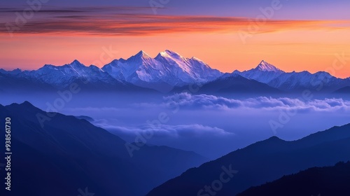 Majestic Mountain Range at Sunrise with Pink and Purple Sky, Clouds, and Snow-capped Peaks.