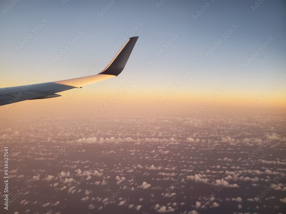 Airplane Flying Over The Ocean In The Evening Airplane Flying Over The Ocean In The Evening