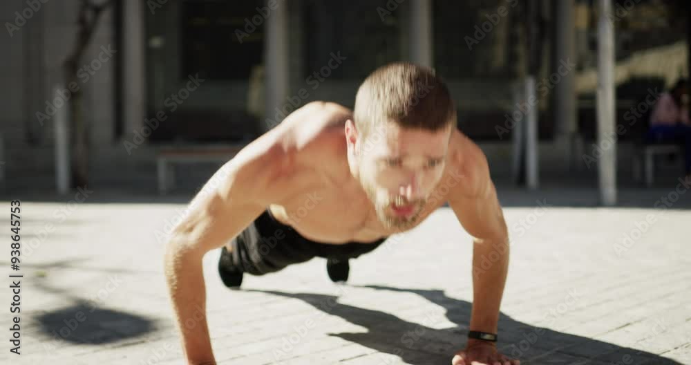 Fitness, city ground and strong man doing push up for exercise, bodybuilder workout or resilience training. Active endurance challenge, muscle building and urban athlete doing determined floor pushup Fitness, city ground and strong man doing push up for exercise, bodybuilder workout or resilience training. Active endurance challenge, muscle building and urban athlete doing determined floor pushup