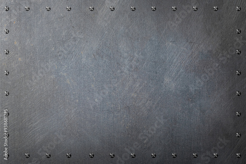 リベットのある古い金属板の背景テクスチャー