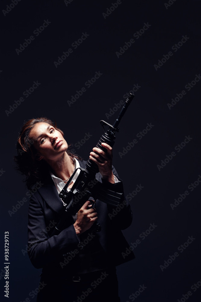 Woman, portrait and suit with rifle in studio for business security and company protection on black background. Female person, mockup and gun for corporate crime, corruption and white collar criminal Woman, portrait and suit with rifle in studio for business security and company protection on black background. Female person, mockup and gun for corporate crime, corruption and white collar criminal