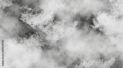 Clouds of dense white smoke emerge against a dark background, forming an abstract, fluid, and vaporous texture. photo