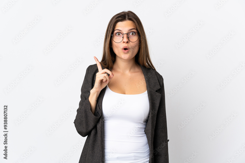 Business slovak woman isolated on white background intending to realizes the solution while lifting a finger up Business slovak woman isolated on white background intending to realizes the solution while lifting a finger up