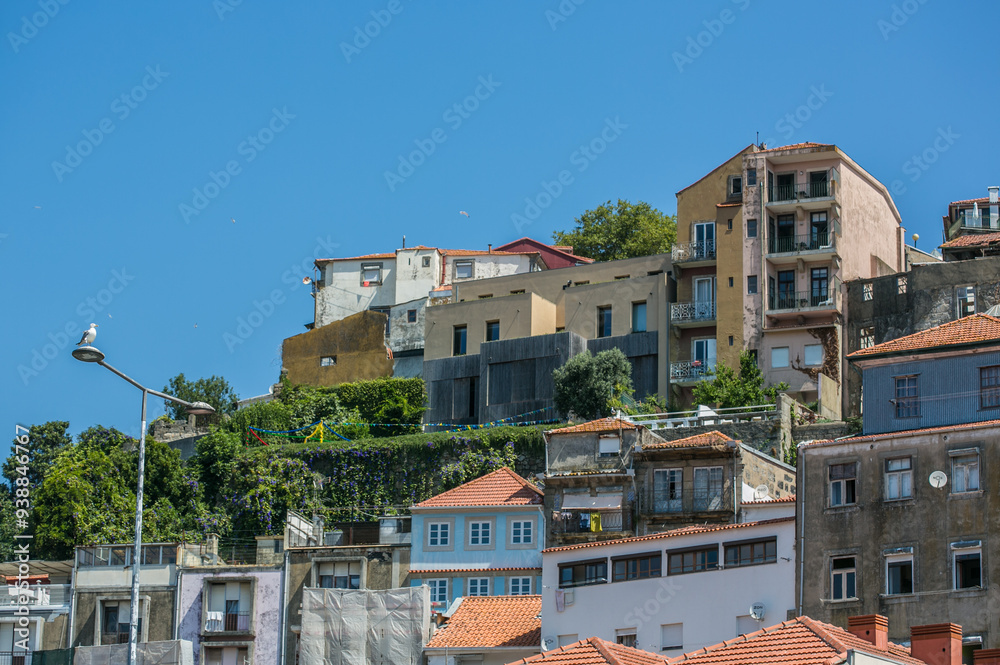 Obraz premium Traditional portugueses buildings with colorful facade and tiles, Porto, Portugal