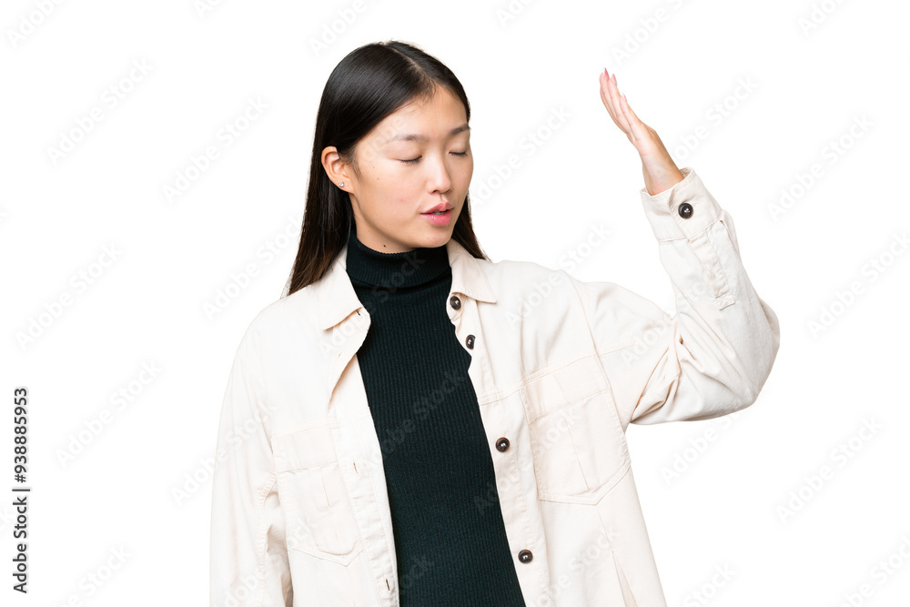 Young Asian woman over isolated chroma key background with tired and sick expression Young Asian woman over isolated chroma key background with tired and sick expression
