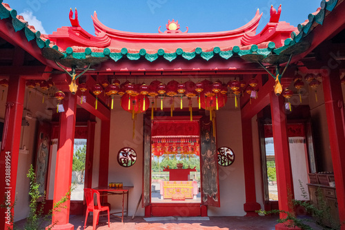 A century old heritage Chinese Temple entrance shows the traditional Feng Shui symbolism and architectural style in Nibong Tebal, Penang, Malaysia. photo