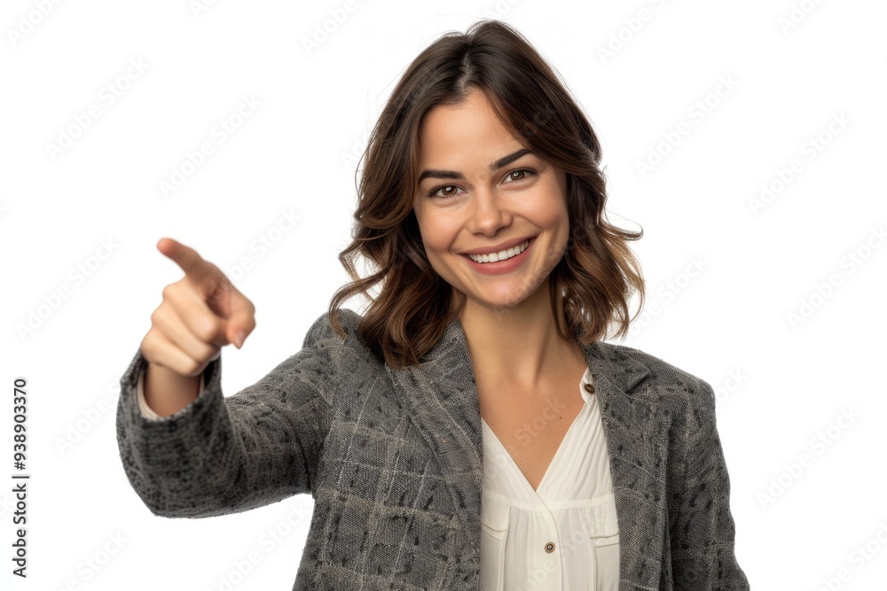 Smiling brunette businesswoman pointing at side. Smiling brunette businesswoman pointing at side.